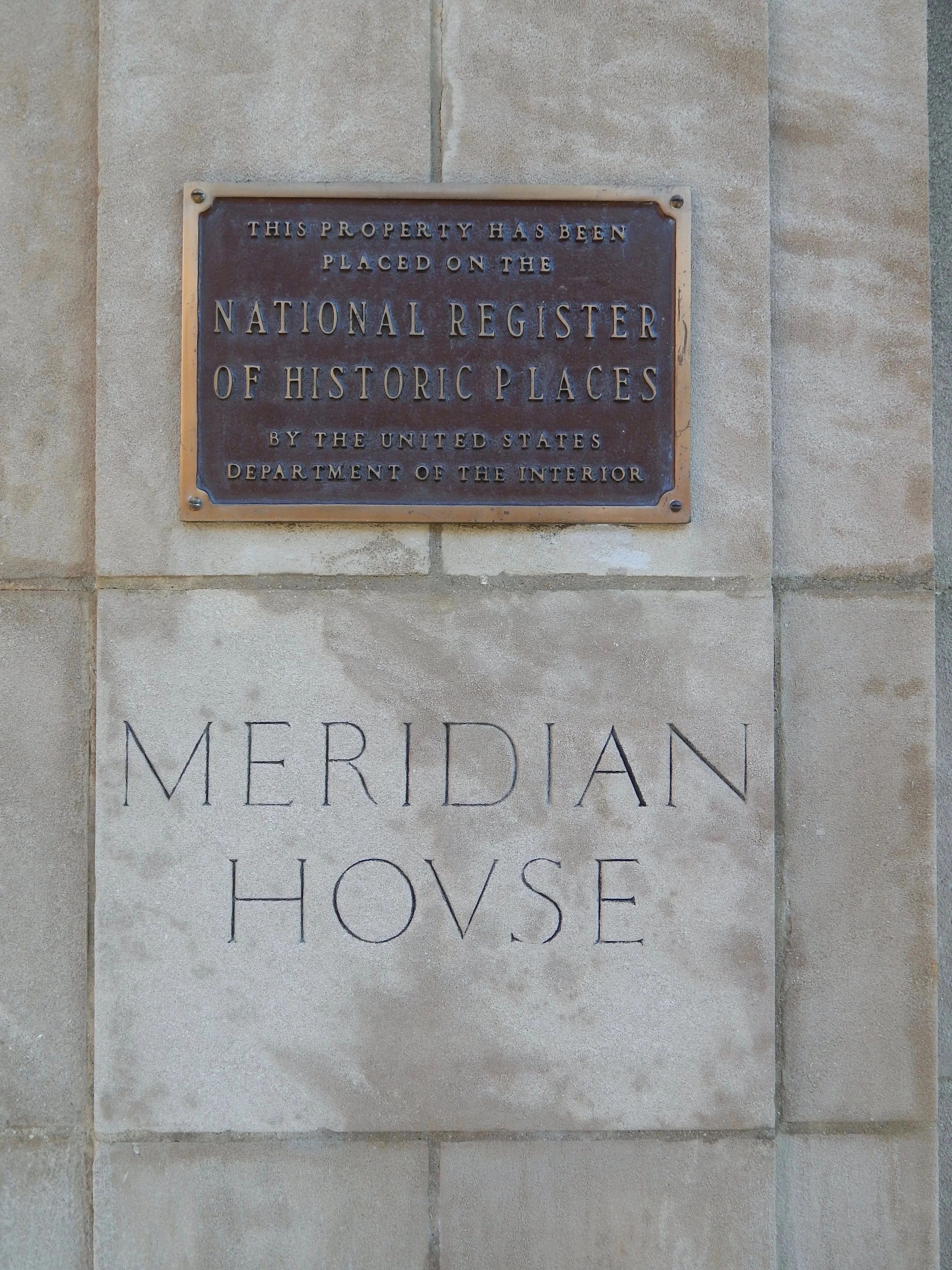 The plaque on the outside of Meridian House, denoting its place on the National Register of Historic Places. Photo by Molly McCluskey.