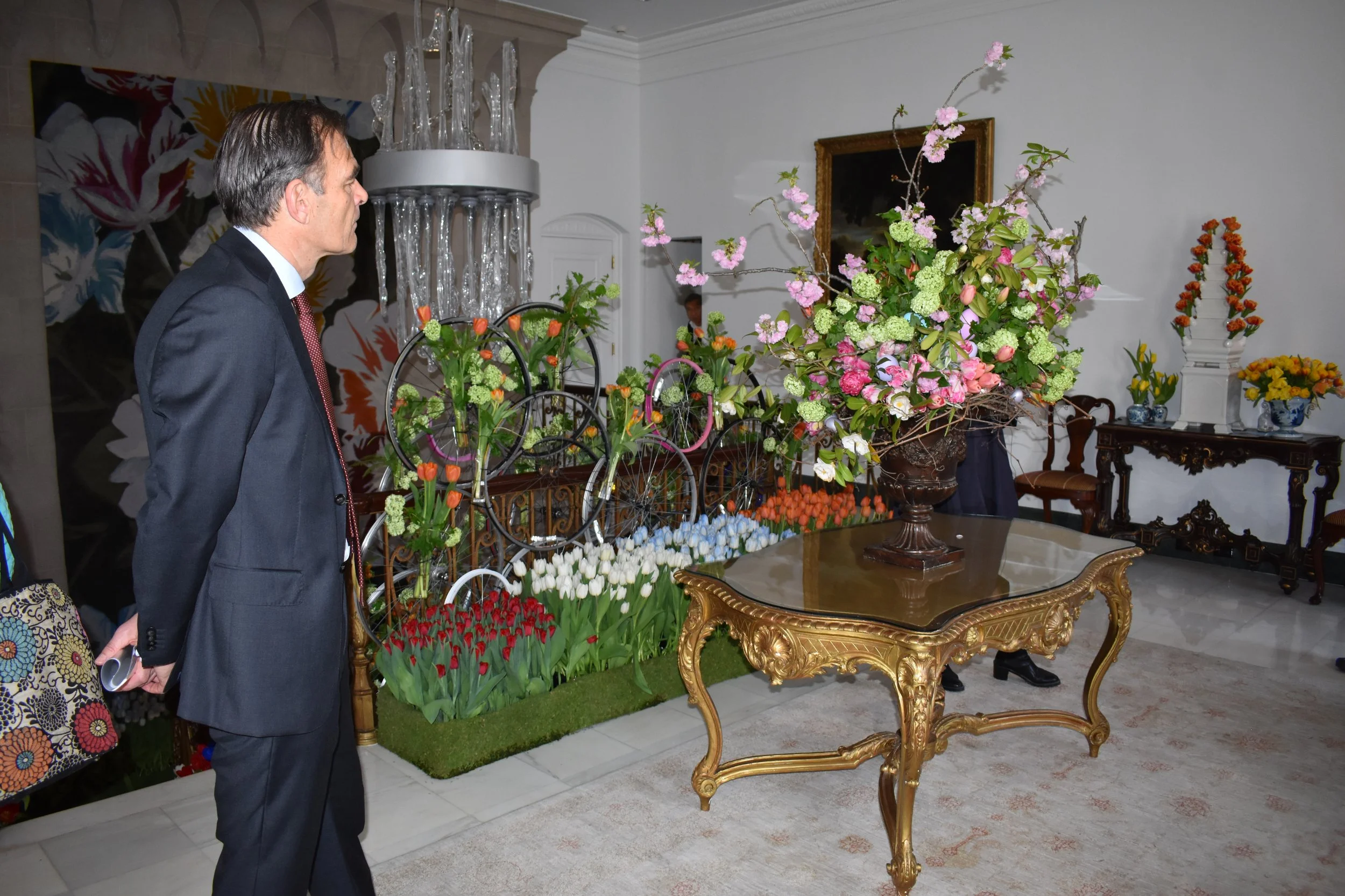 Ambassador André Haspels surveys the displays on the second floor of the residence during Tulip Days. Photo by Diplomatica Global Media.