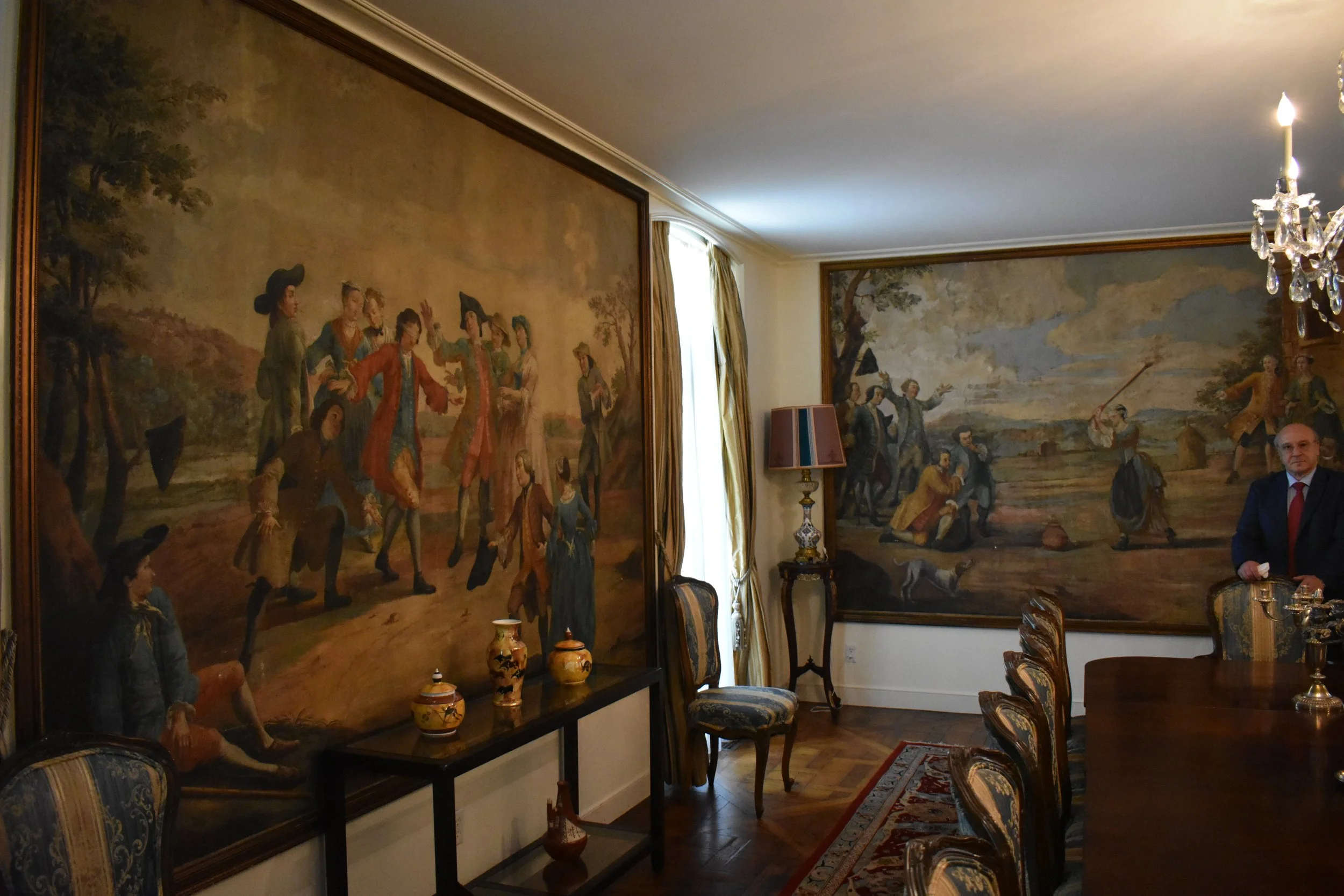 Large murals, later framed, remain in the formal dining room from Perle Mesta's ownership of The Elms. Photo by Molly McCluskey.