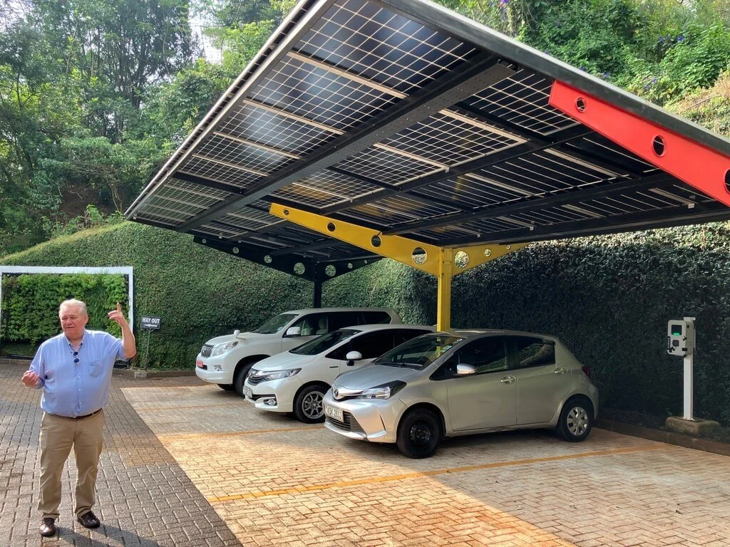   Ambassador Peter Maddens explains the solar panel upgrades to the embassy’s car park. He hopes to fully electrify the fleet. Photo by Diplomatica Global Media.   