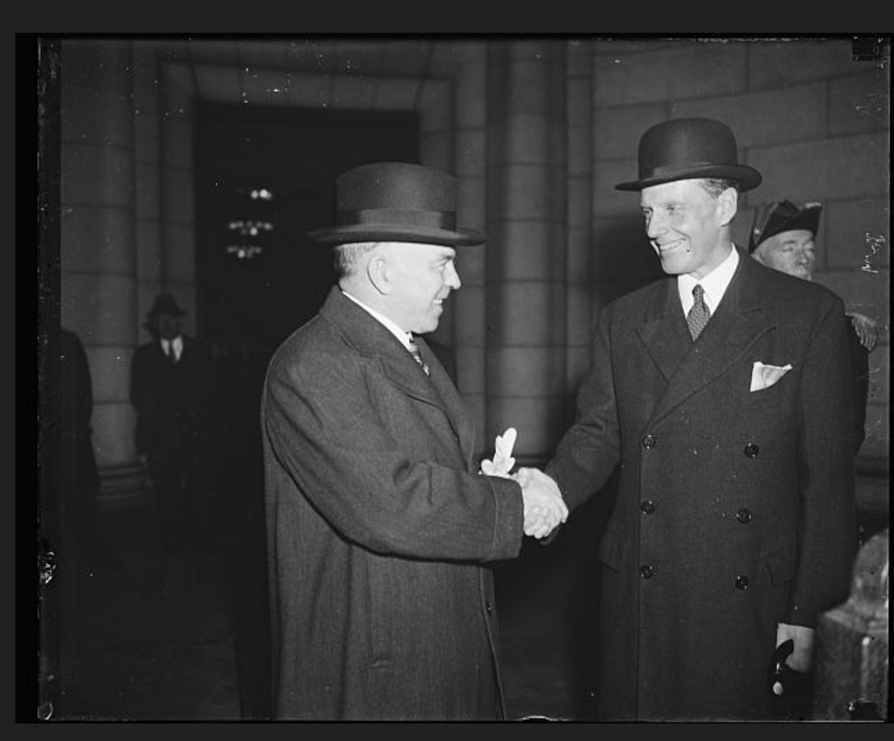 Prime Minister William Mackenzie-King, left, greeted by Acting Secretary of State, William Phillips in Washington, D.C. Photo courtesy of Library of Congress.